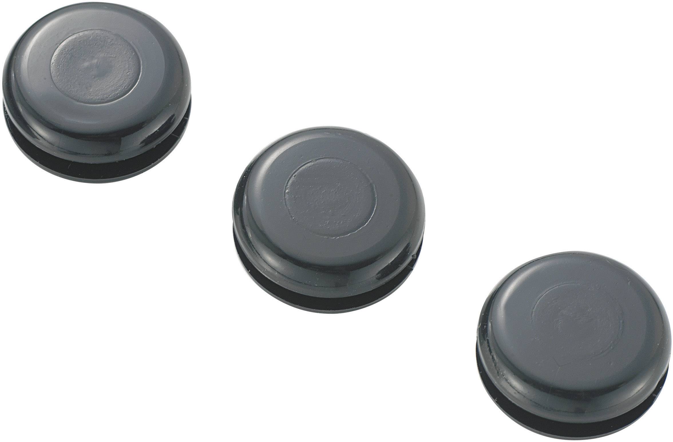 Three black cabinet magnets in a slightly curved arrangement.