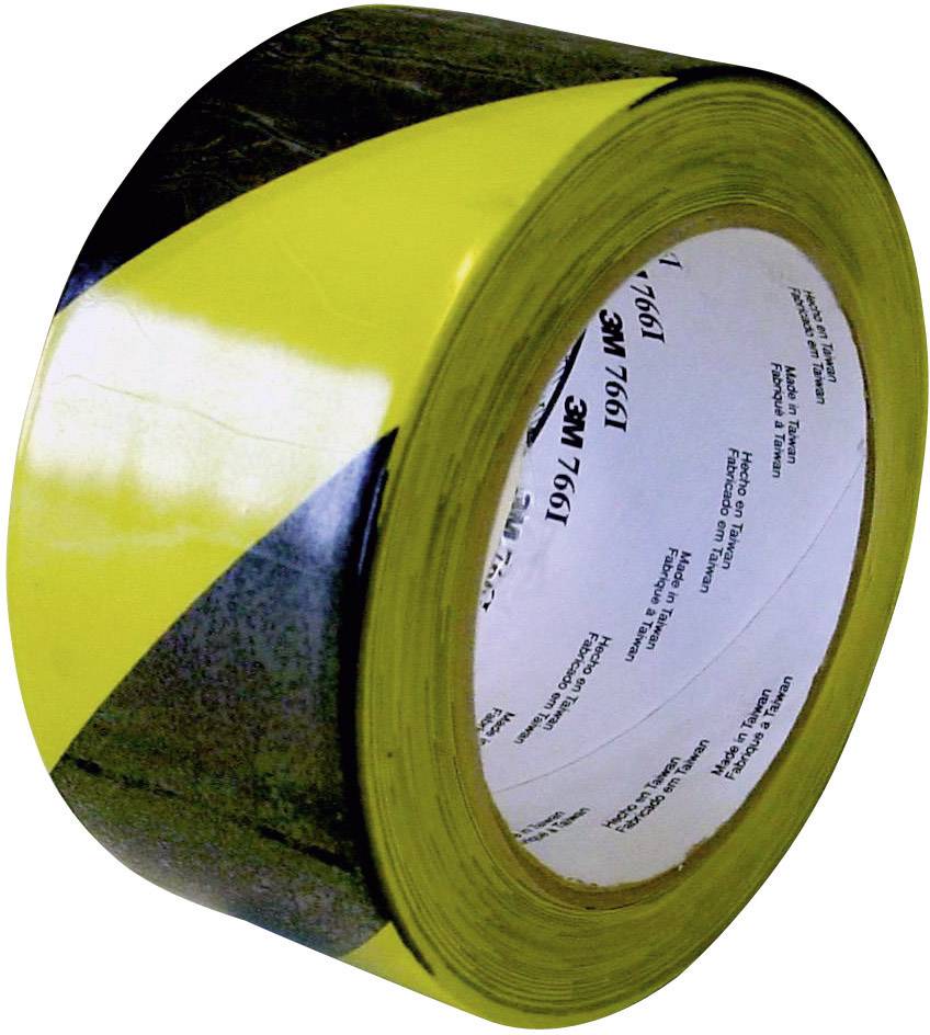 Yellow and black safety warning tape used for marking hazard zones on construction sites and storage areas.