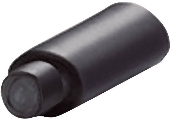 A black marker with a rounded cap lies at an angle on a white surface.
