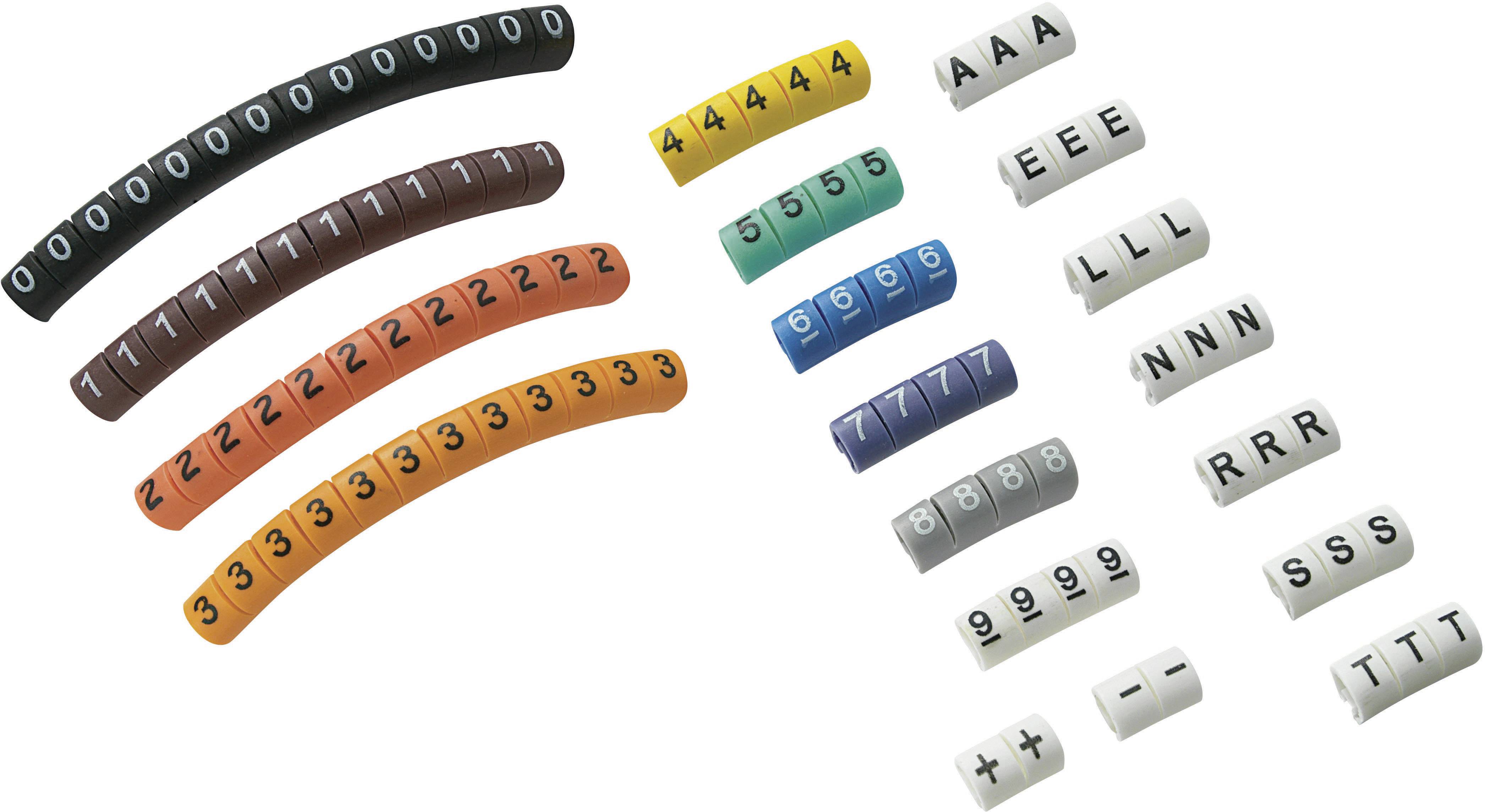 Colourful play pieces in various shapes and numbers. Curved rows on the left with numbers from 0 to 3, individual stones with letters on the right.