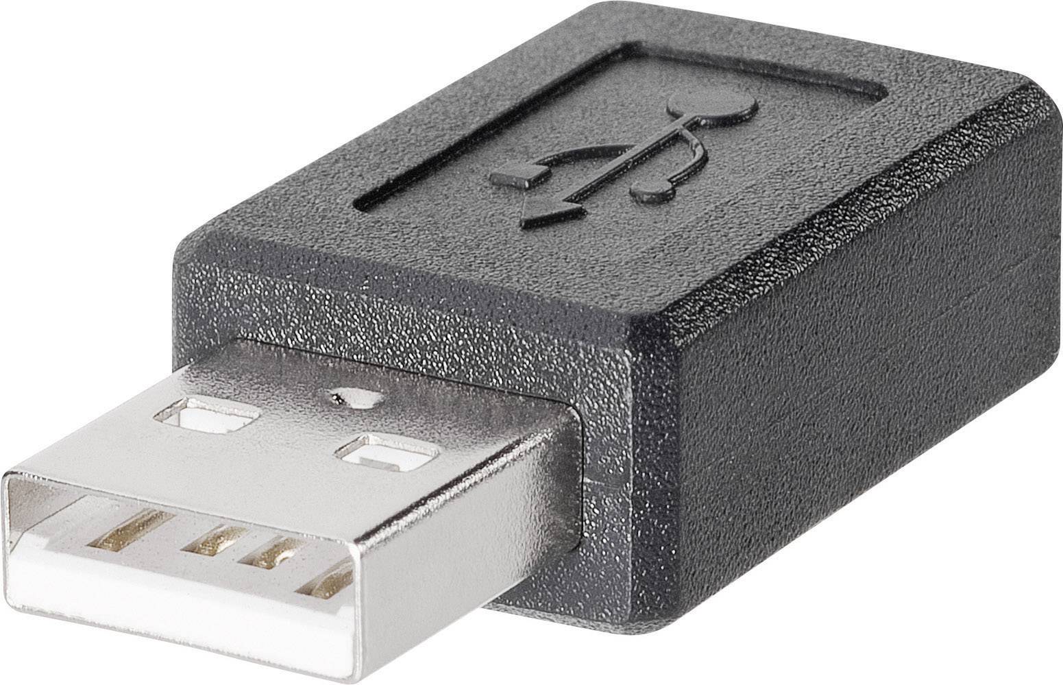 A USB security adapter, small and black, with the USB symbol on it, serves to protect against data loss from USB devices.