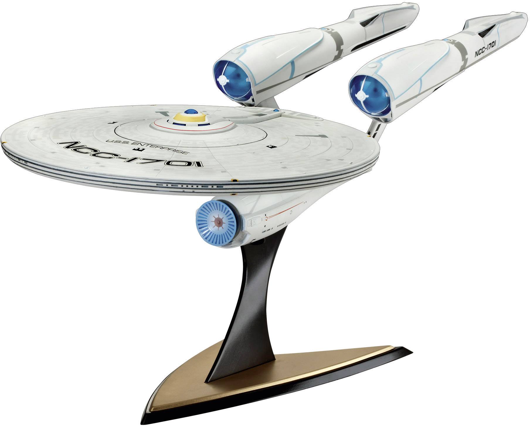 A model of a futuristic spacecraft with two long, slender engines and a flat disc-like structure mounted on a stand.