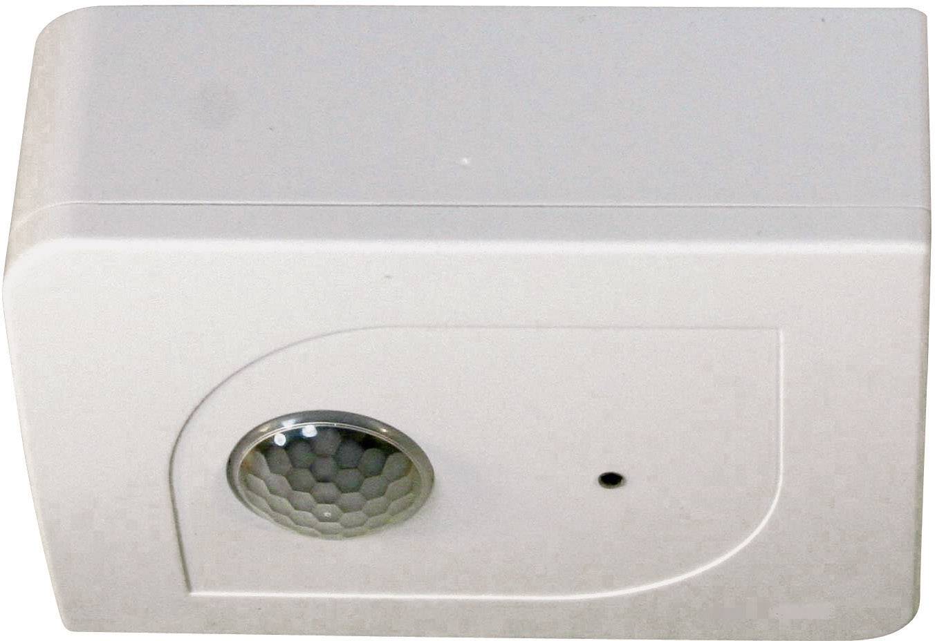 A white motion sensor with a sensor lens and a small black dot on the front, for security monitoring.
