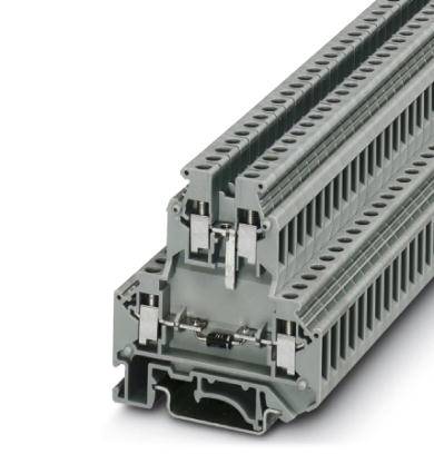 A grey multi-level terminal block with several connections, used for secure electrical connection in control cabinets.