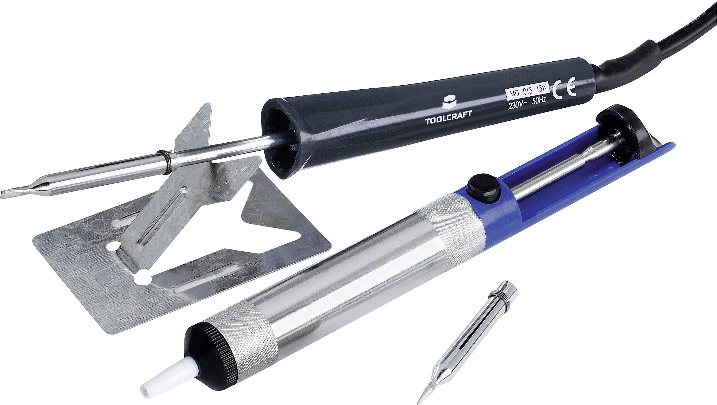 Soldering iron and desoldering pump on white background; tool set for soldering and desoldering.