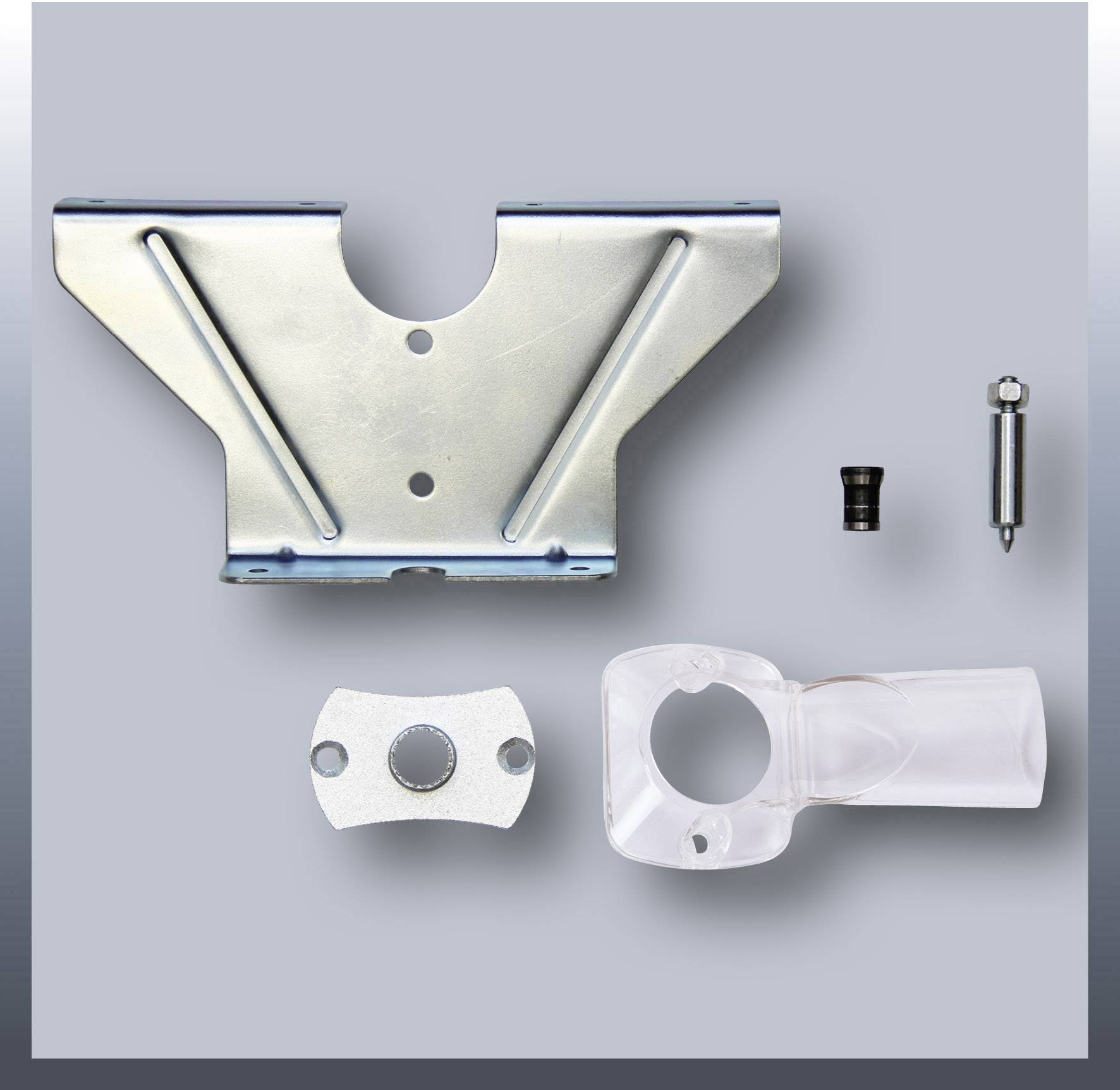 Various metal and plastic components on a grey background, including a clip, fastening parts and a mounting bracket.