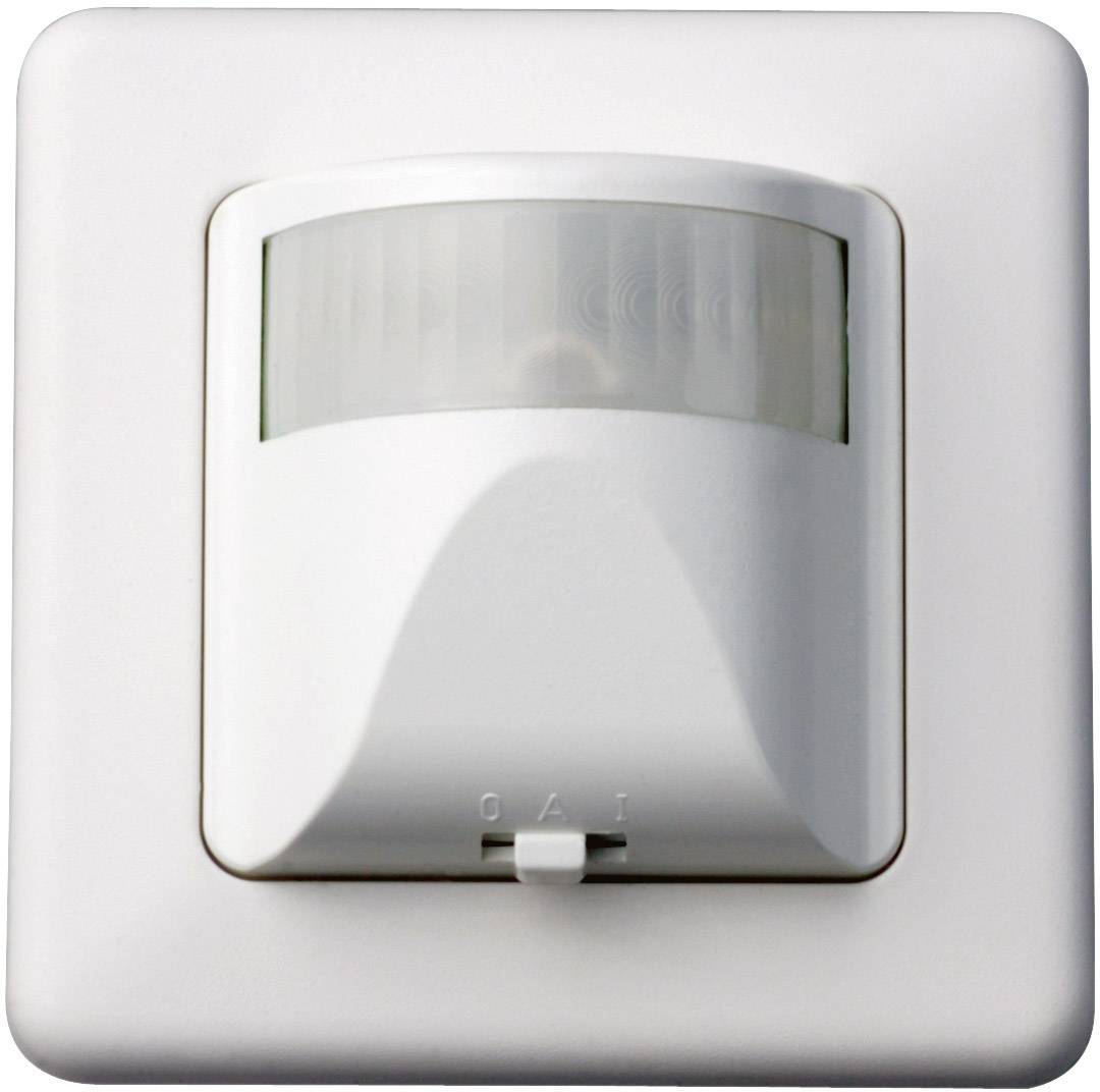 Motion sensor on a white wall. It is equipped with an infrared sensor for detecting movement in the room.