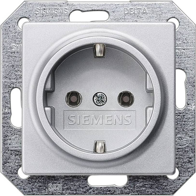 A silver socket with the inscription 'SIEMENS', mounted on a metal plate.