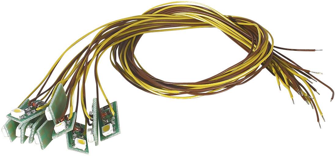 Several green circuit boards with yellow and brown wires attached to LED displays.