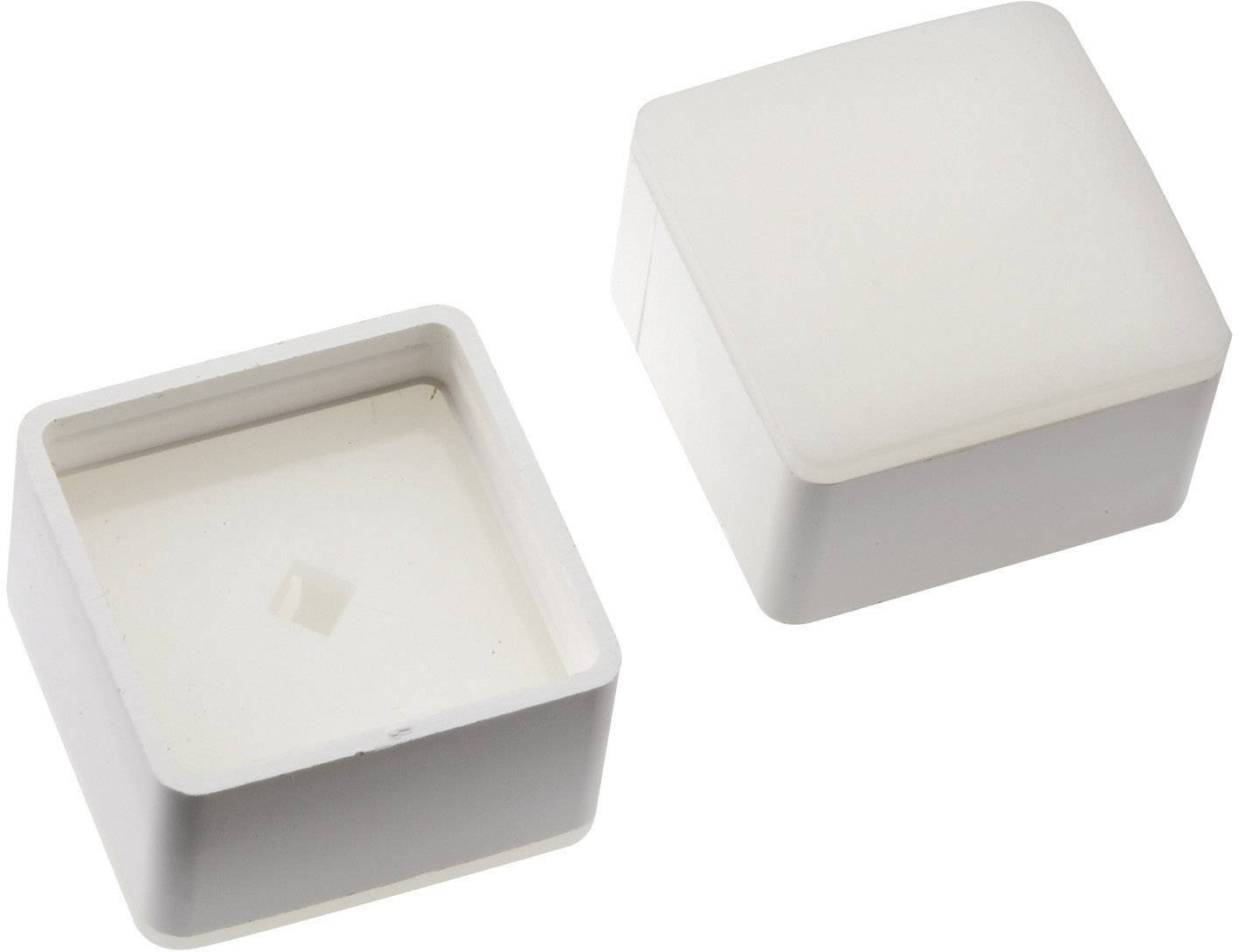 Two square, white plastic covers; one is open and reveals the interior, the other is closed.