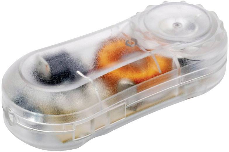 Transparent plastic pencil sharpener with visible metal blade and internal mechanisms.