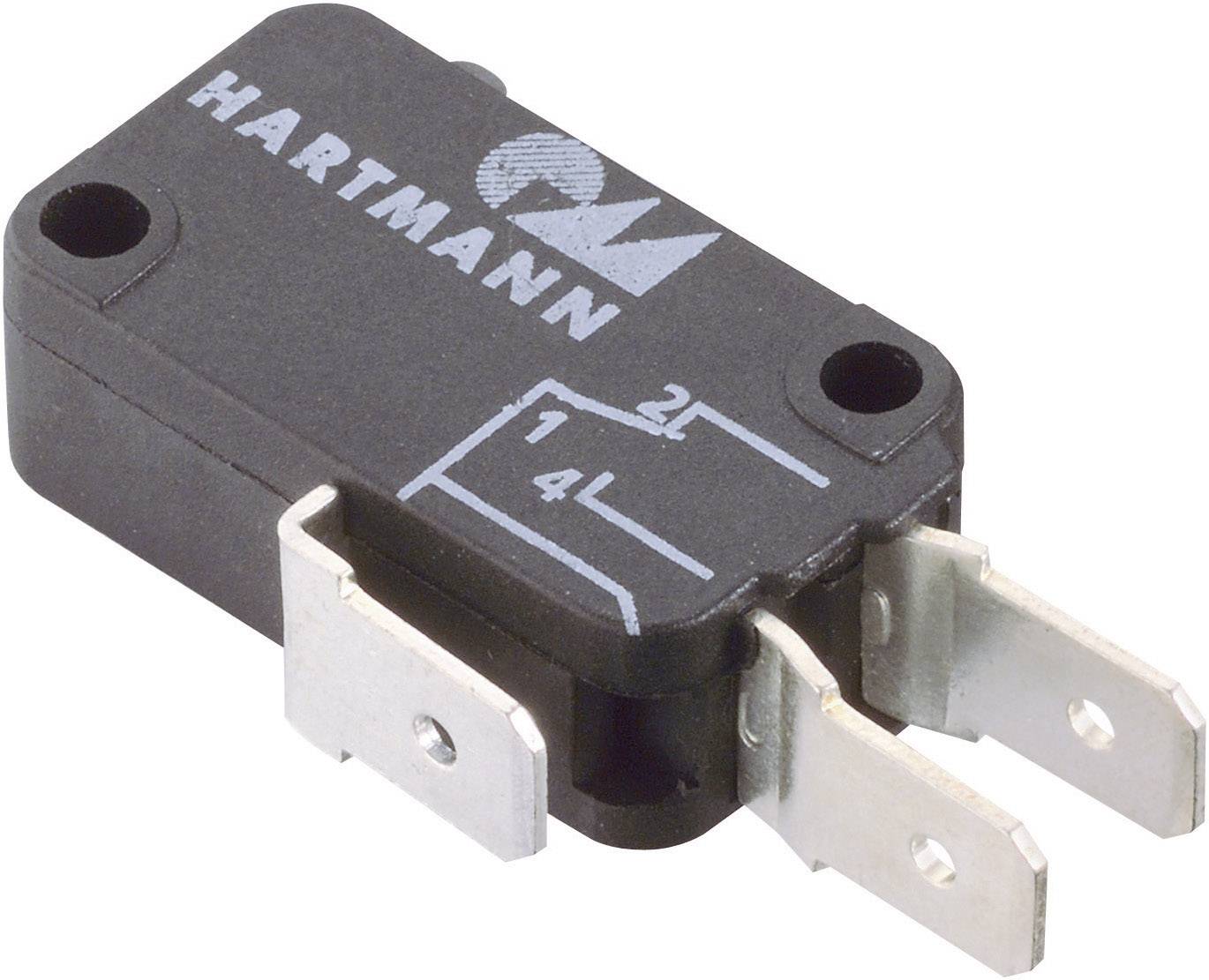 Close-up of a black micro-switch by Hartmann with two metal connections and embedded circuit diagrams.
