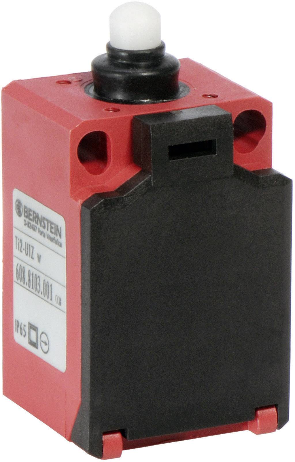 A red and black limit switch with a white button, used in industrial applications for position monitoring.
