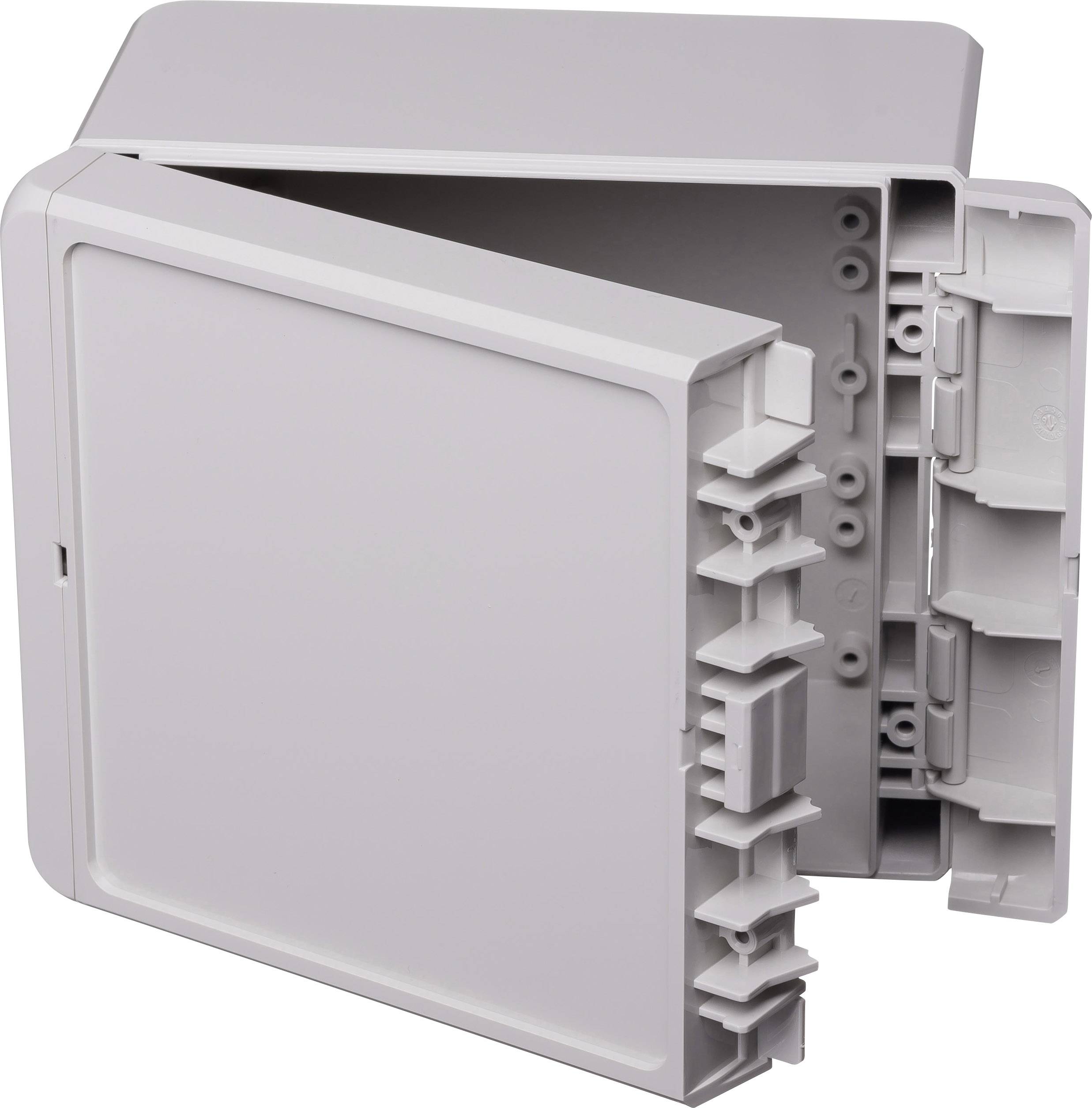 A grey open plastic box, possibly a distribution box, reveals its internal structure with multiple mounting points.