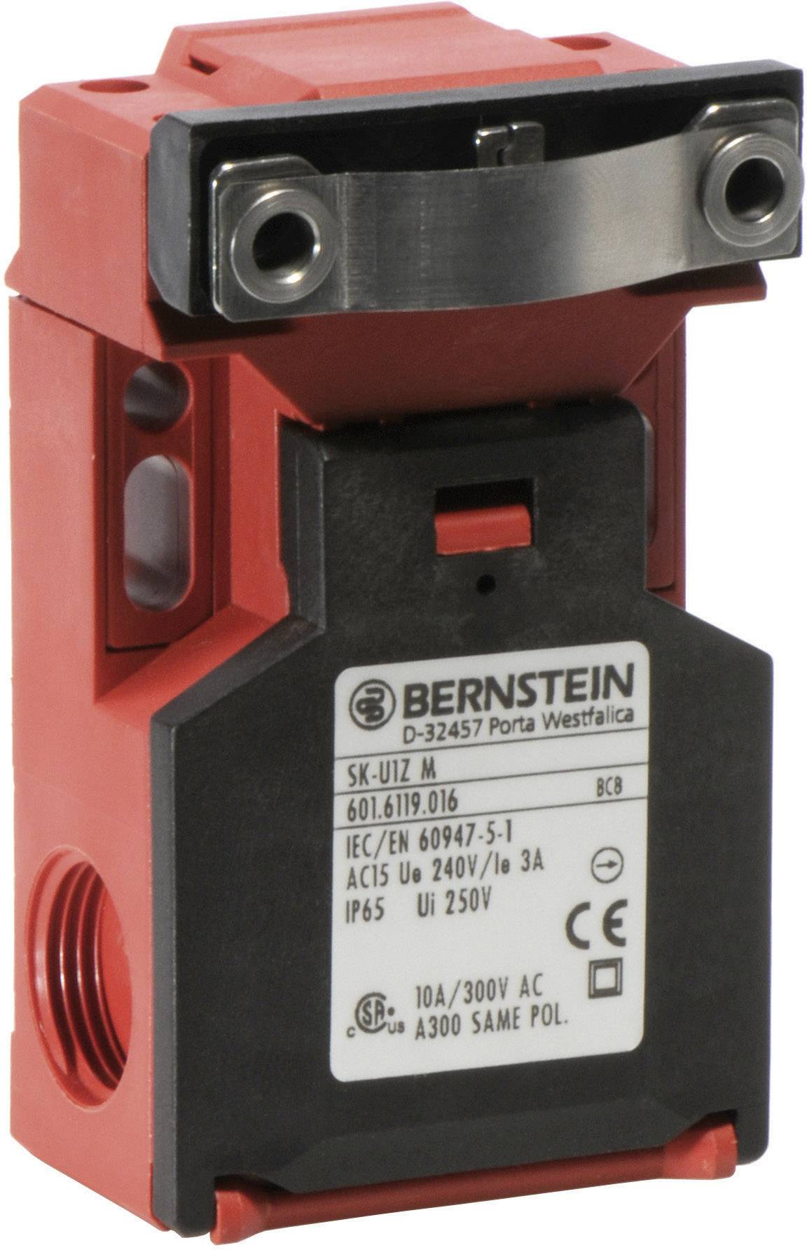 A Bernstein safety end switch, Model SK-U1Z M, with a red housing, black control panel, metal bracket on top, and technical specifications.
