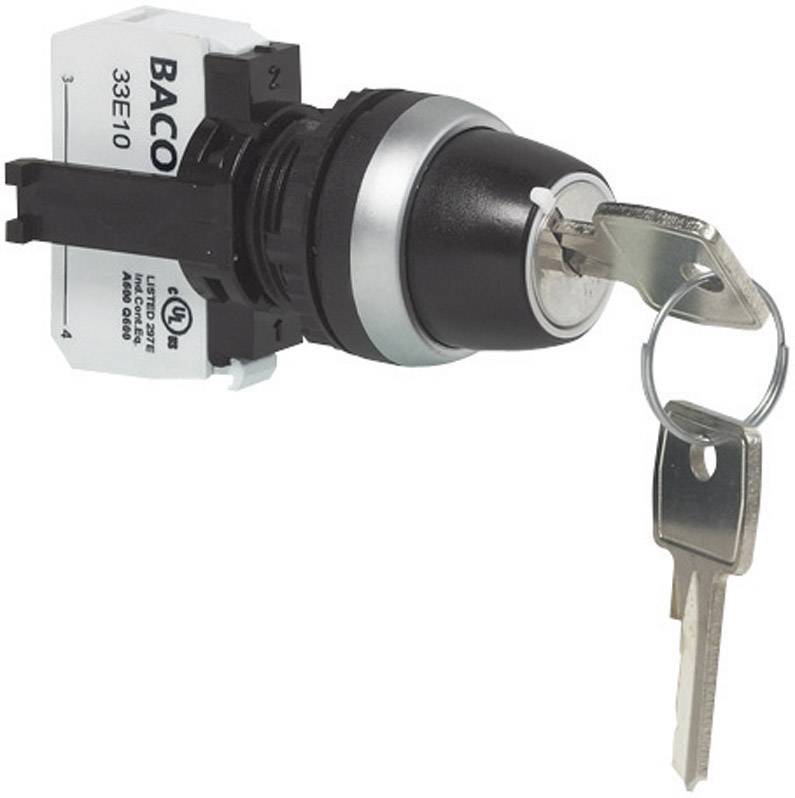 The key is inserted in a key switch marked 'BACO'. The switch has a black, cylindrical handle.