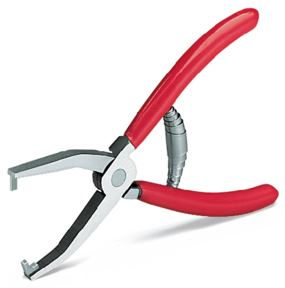 Red clamp with spring-loaded handles, opened in a side view, on a white background. Tool for electrical work.