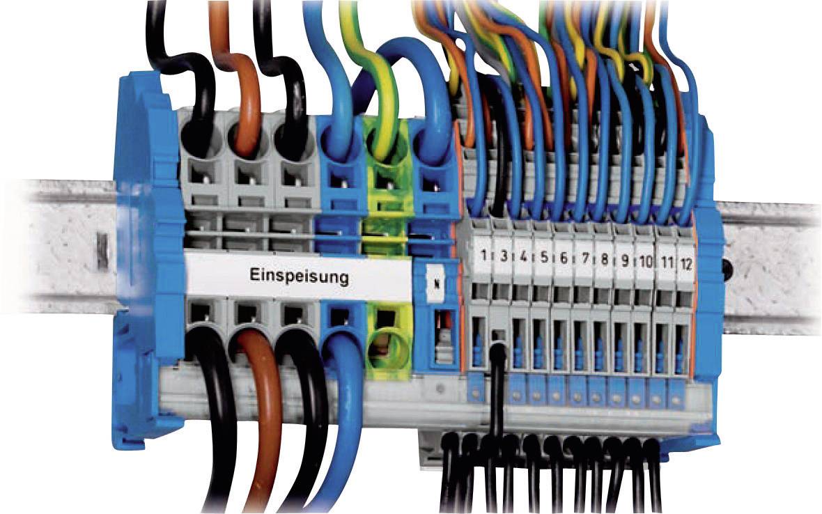 Wired electrical terminal block strip for 'input', numbered from 1 to 12, connected with various coloured cables.