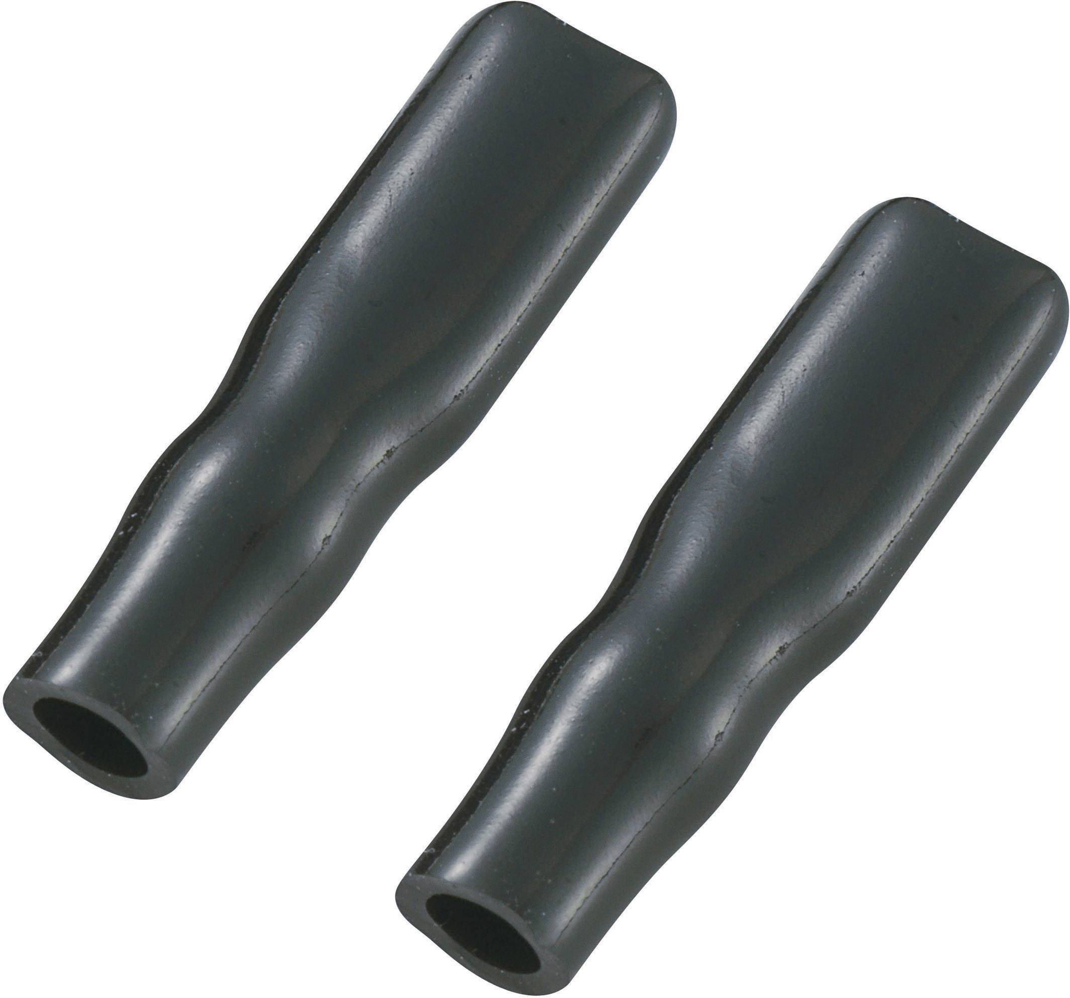 Two black, hollow plastic caps, possibly protective covers for cable ends, lying side by side.
