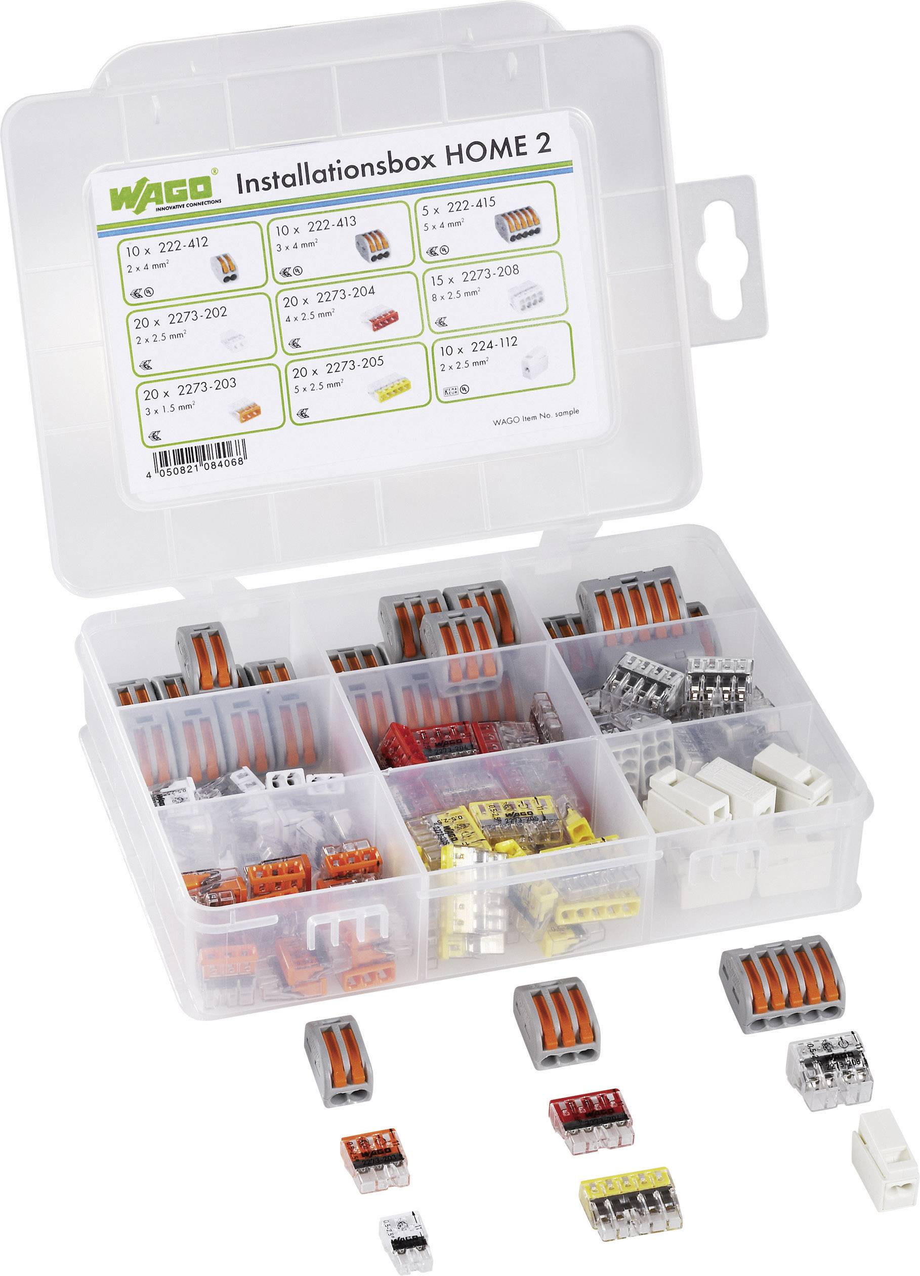 Installation box by Wago with various terminal blocks in an open plastic housing, divided into labelled sections.