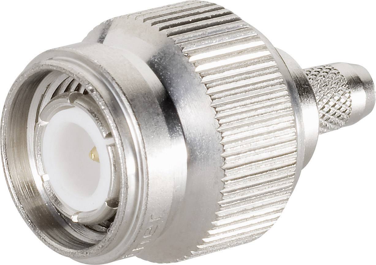 A silver coaxial plug with a ridged outer surface and visible central pin, used for cable connections.