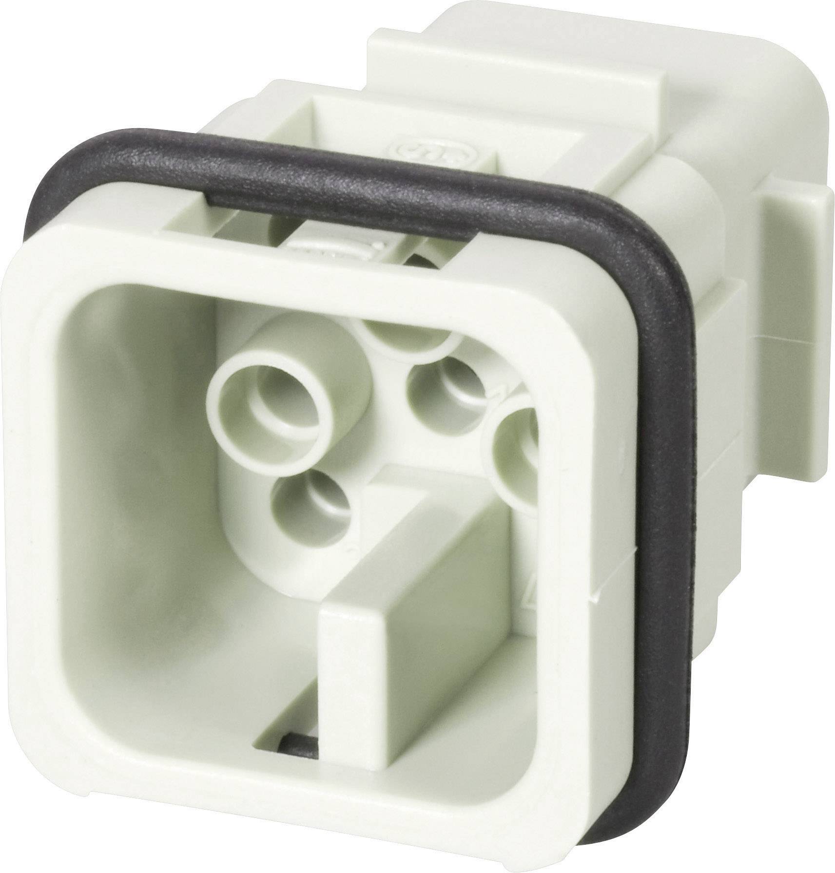A white plastic plug with a black border, rectangular in shape with multiple circular connections inside.