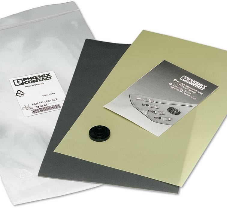 Bag of electronic accessories from Phoenix Contact, including a black cover and a promotional leaflet with product information.