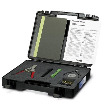 Tool case with instruction manual, crimping tool, pliers, tester and connectors, laid out in foam insert for organised storage.