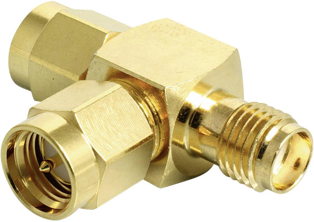 A golden coaxial adapter with two different connections, one screw and one plug connection, for use in electronics.