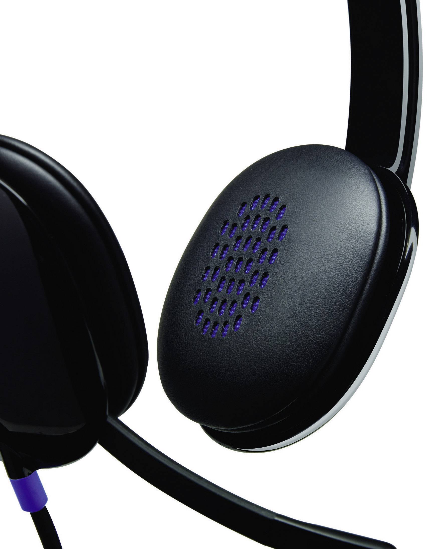 Black over-ear headphones with intact ear cups and a curved headband, side close-up view.