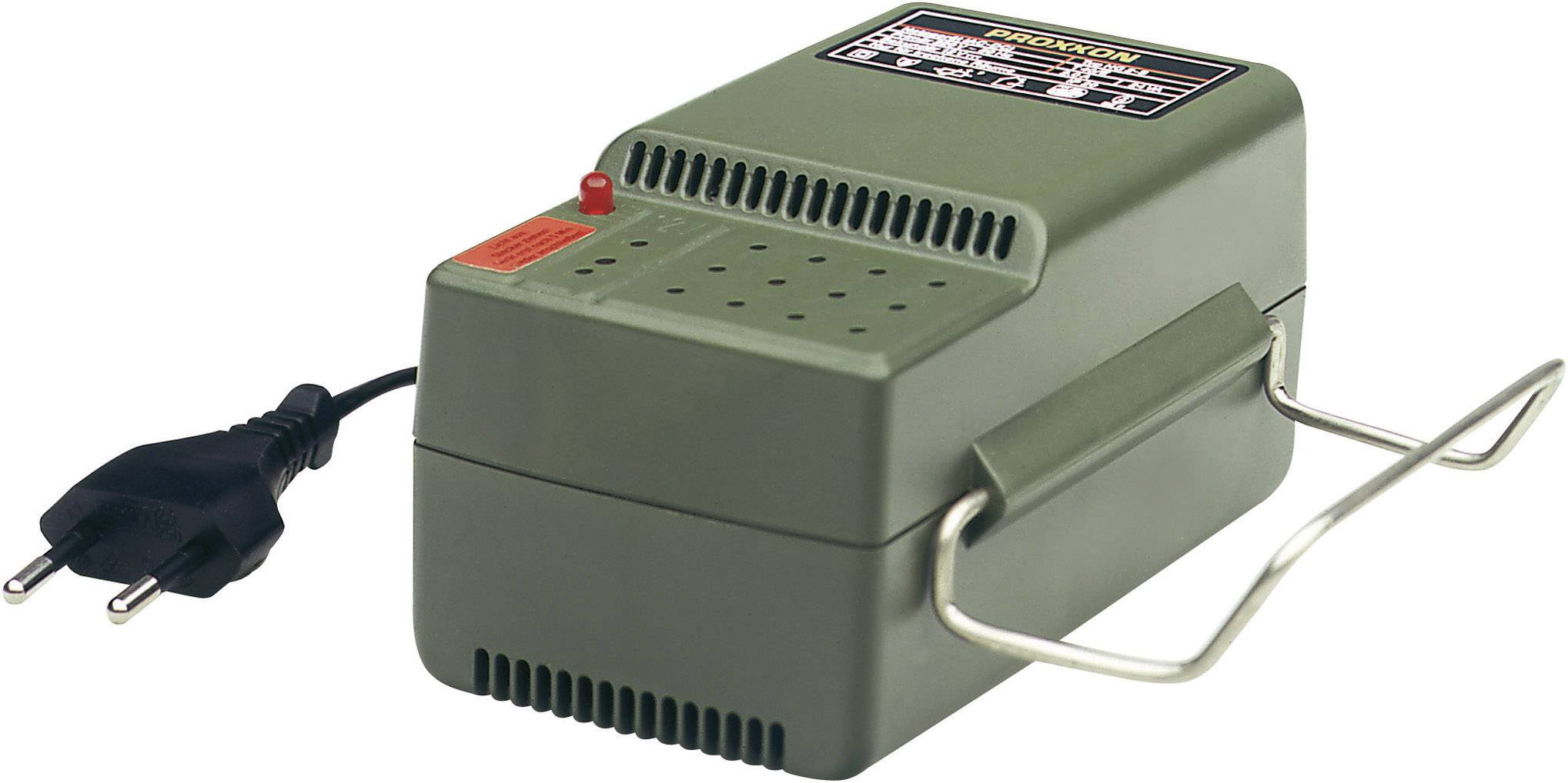 Green electric device with a black power cable and metal handle. Top surface featuring perforated pattern and a red button.