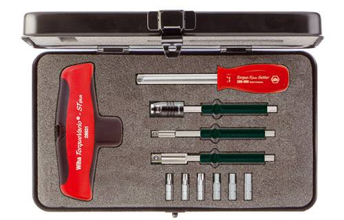 Tool kit with torque handle, multiple socket wrenches and screwdriver bits, specifically designed for precise assembly work.