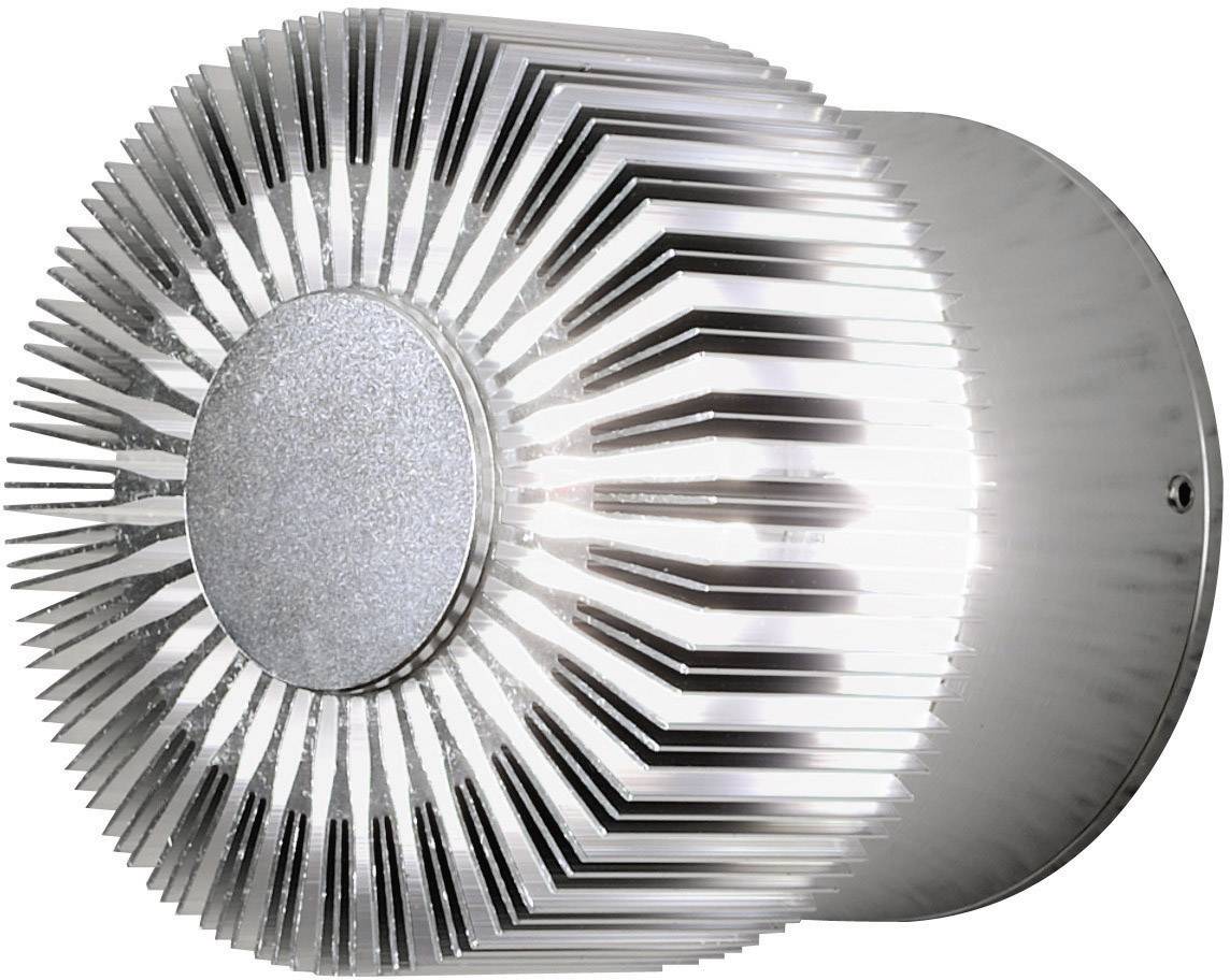 Silver, cylindrical metal object with radial, pointed ribs.