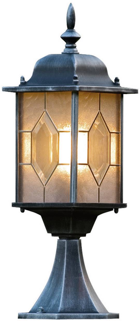Decorative metal exterior lantern with geometric glass design, emitting a warm glow. Perfect for garden or terrace lighting.