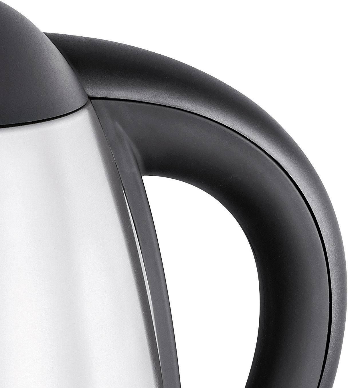 A gleaming kettle with a black handle, partially visible.