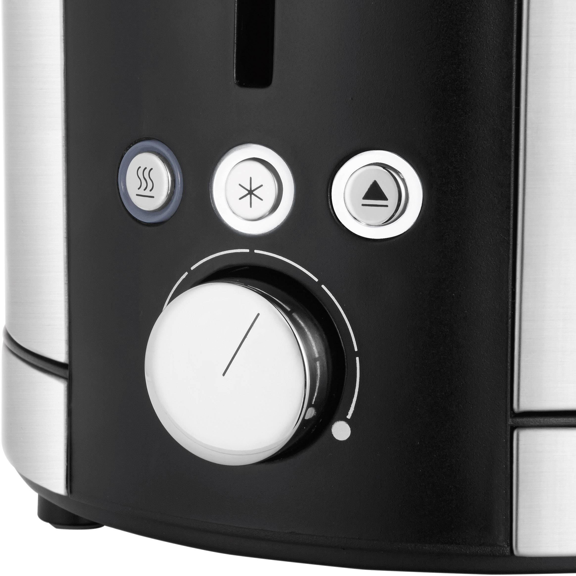 Close-up of a toaster with a rotary dial for temperature adjustment and three function buttons to control toasting intensity.