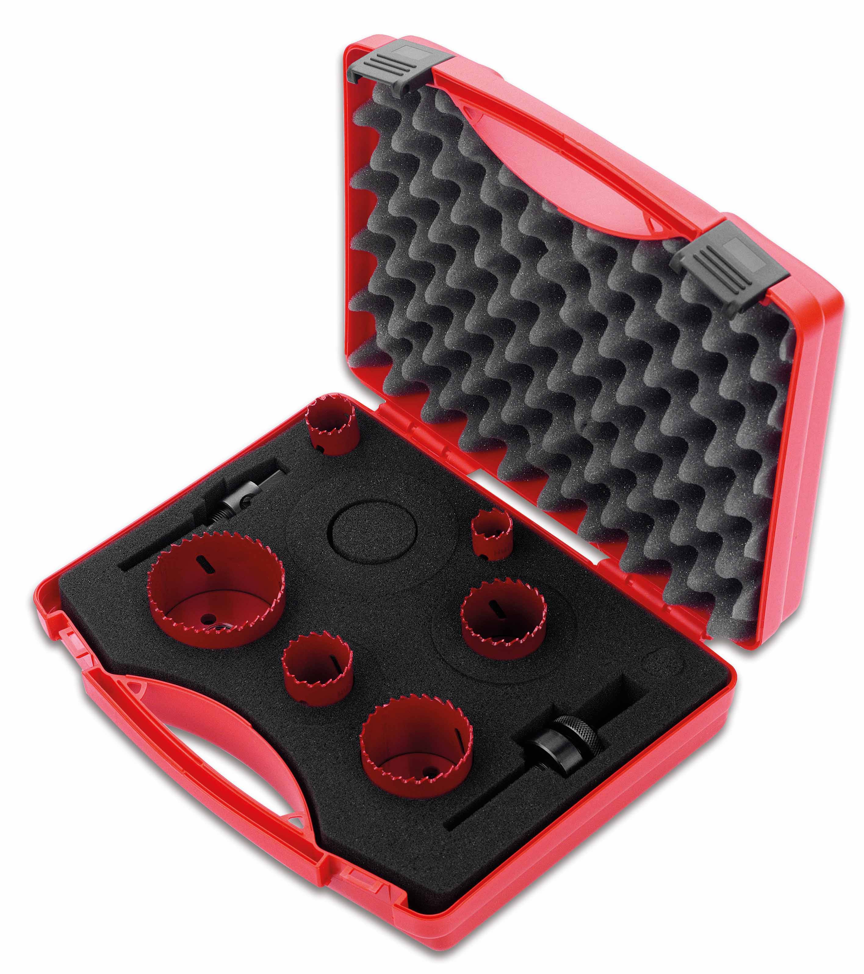 Red toolbox with six hole saws in various sizes and foam lining for protection, shown open.