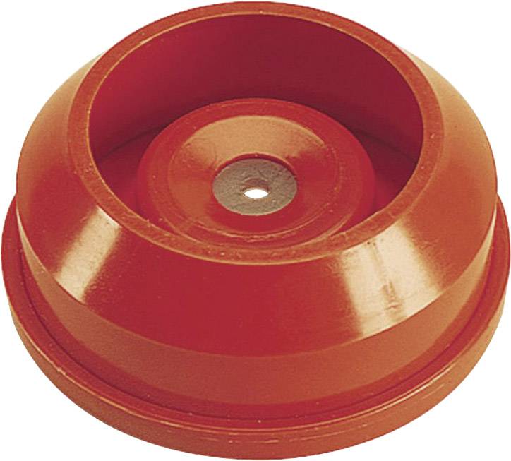A red plastic lid with a cylindrical design and a small hole in the centre, placed on a flat surface.