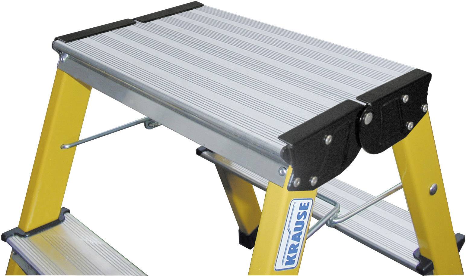 A yellow metal folding ladder, folded up, shows the upper section of steps with non-slip strips.