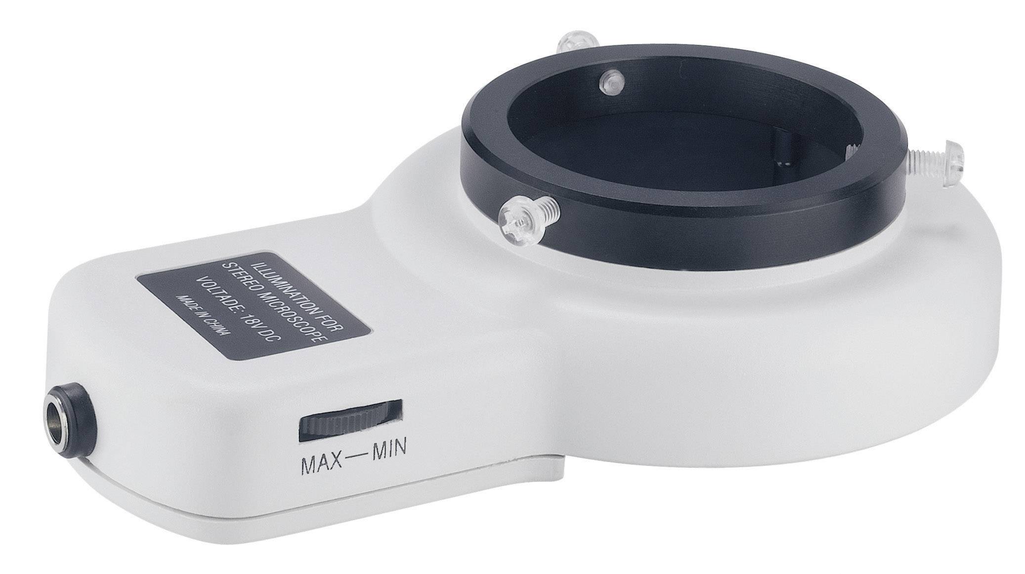 A white, round device attachment with a black inner rim and a volume control on the side, labelled 'MAX - MIN'.