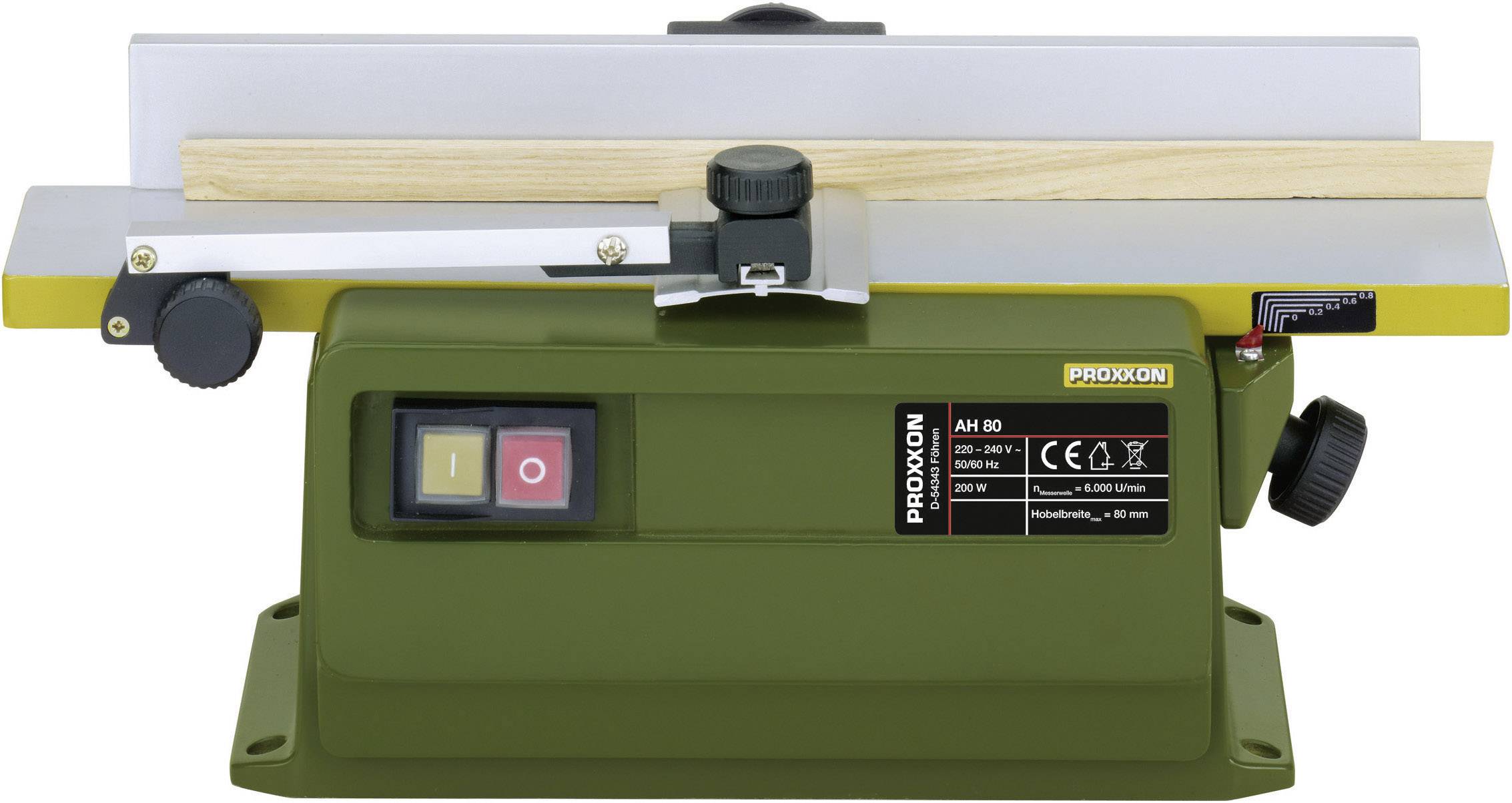 Small green tabletop planing machine with wooden guide. Two switches are located on the front. Brand name and technical details are visible.
