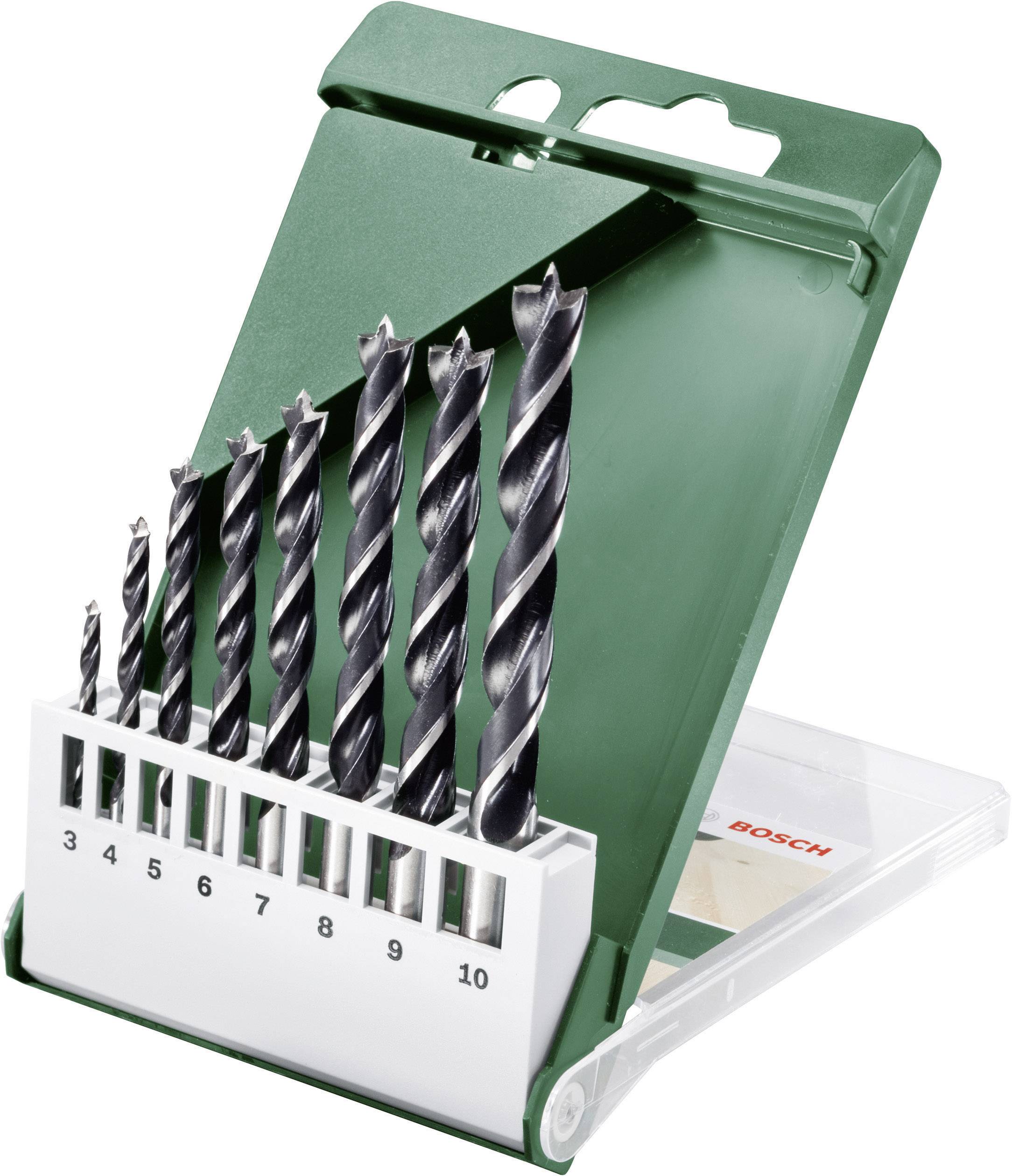 A set of seven metal drill bits in a green plastic case, numbered from 3 to 10, for precise drilling in various sizes.