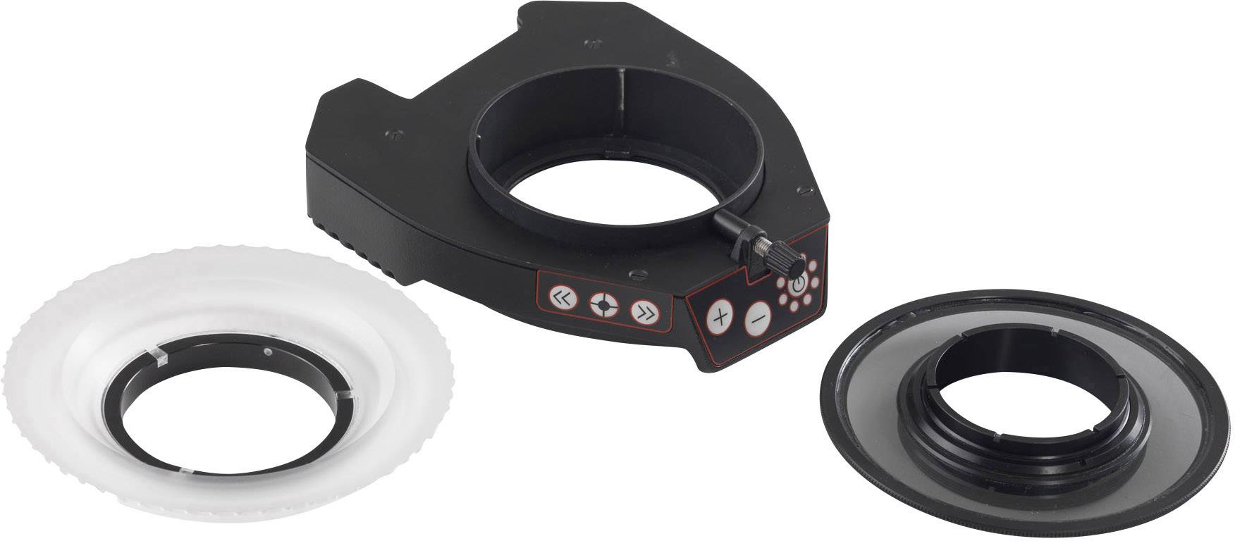 Camera ring flash device with control symbols, surrounded by a white and a black adapter ring, on a white background.