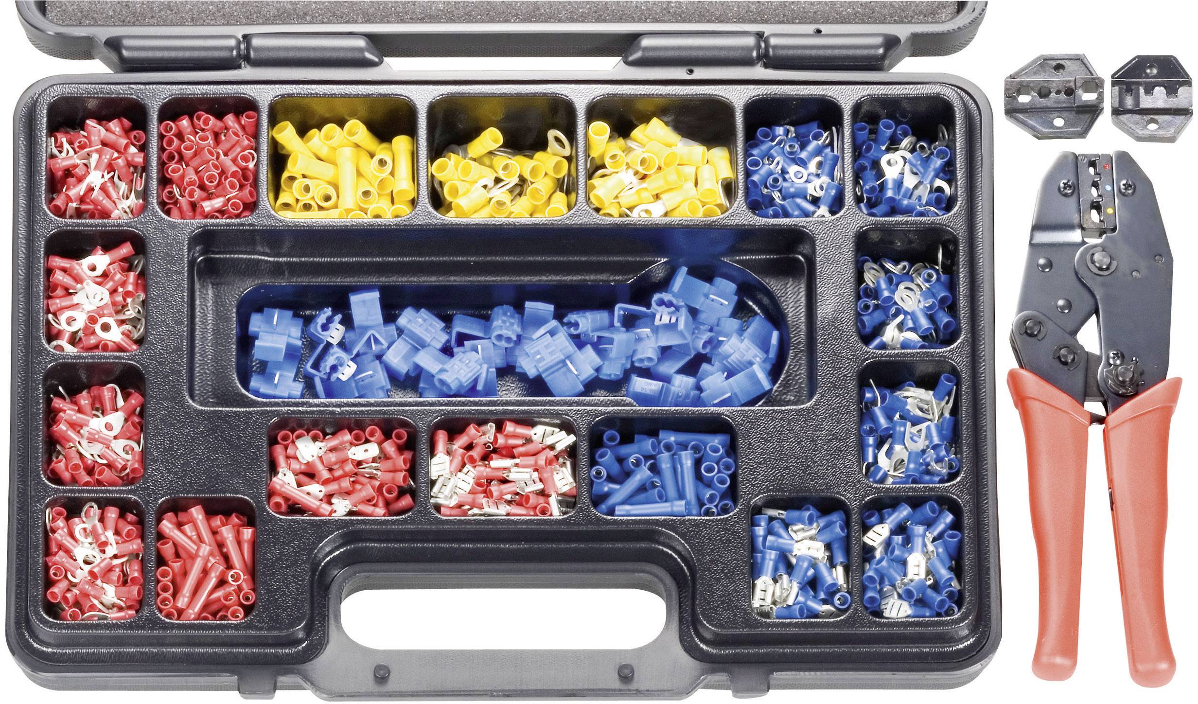 An open toolbox with various coloured cable connectors and a crimping plier next to it on the right.