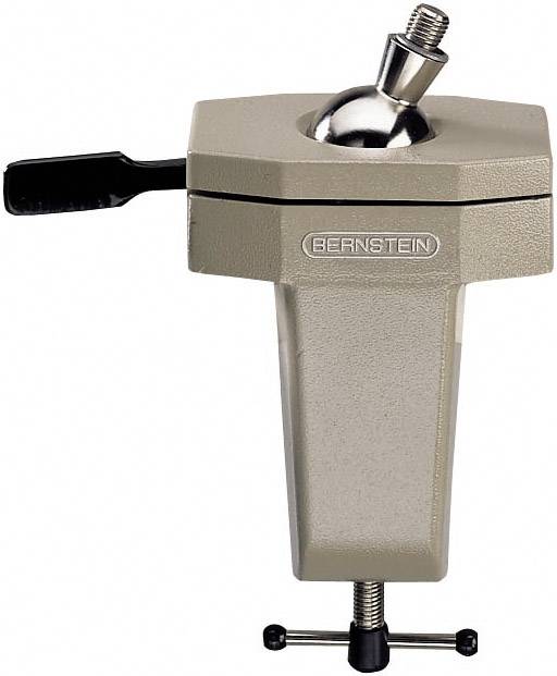 A sturdy vice with a rotating ball on the top and a handle for securing workpieces.