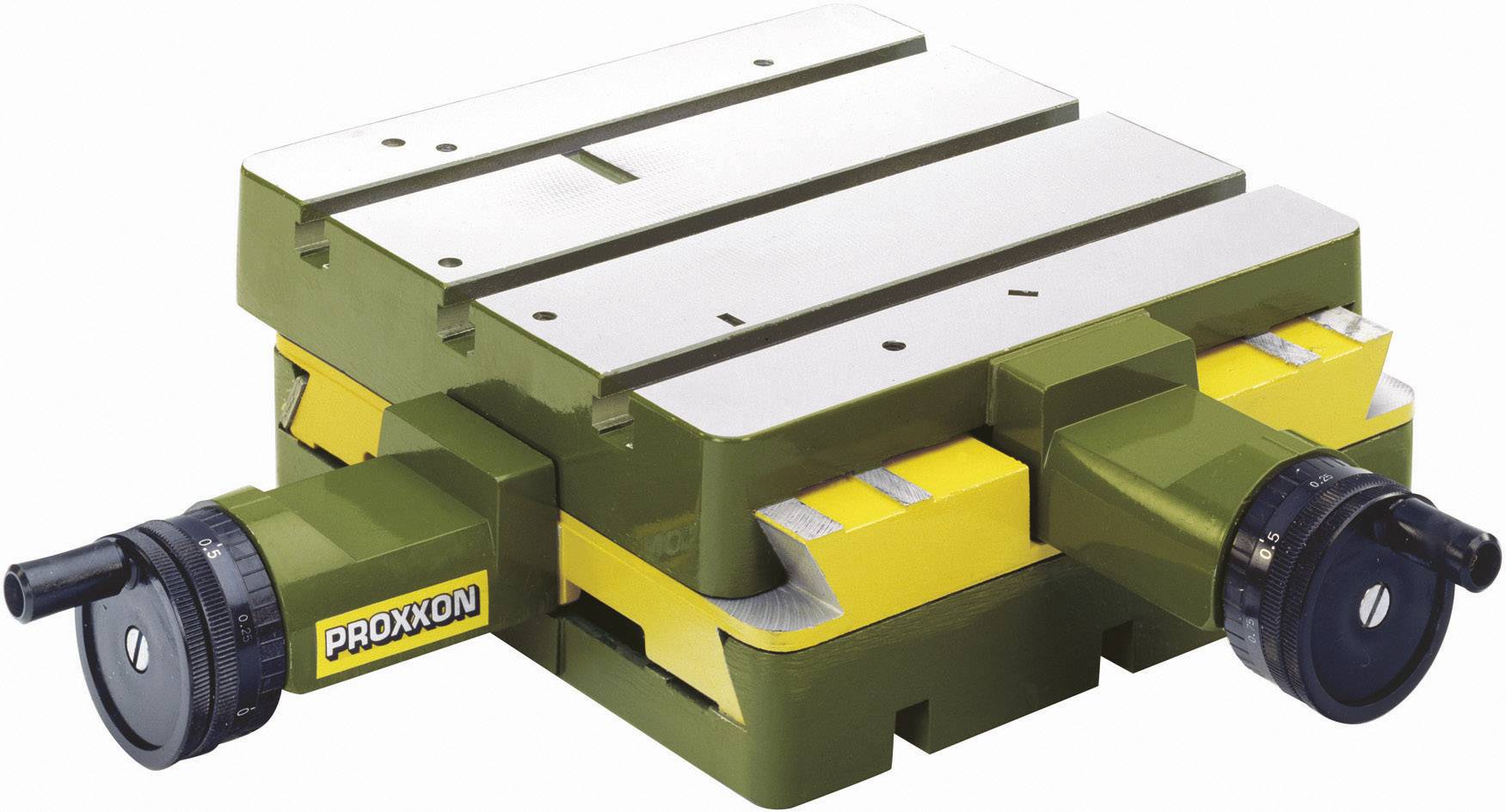 A green, heavy metal cross table with two handwheels for precise positioning of materials during work.
