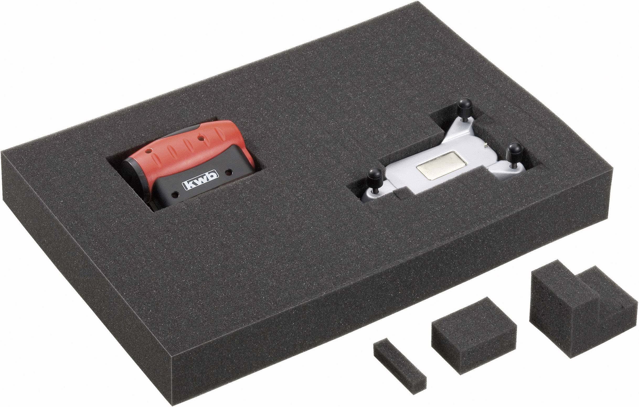 A black foam container with a red KWB tool and a silver accessory part, with additional foam blocks.