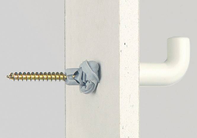 Screw and wall plug secured in a wall; a hook on the opposite side. Demonstrates a safe mounting method for hanging materials.