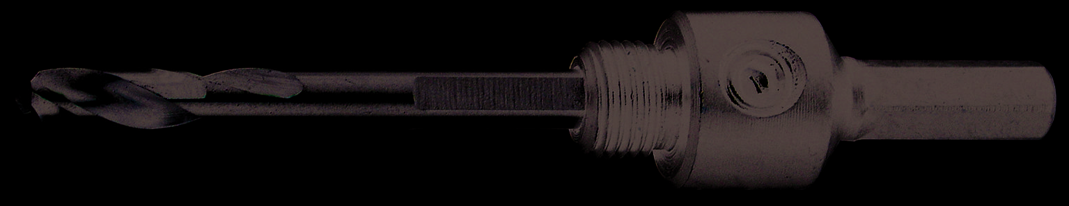 Metal drill bit with holder, ground, black, suitable for wood and metal work, close-up.