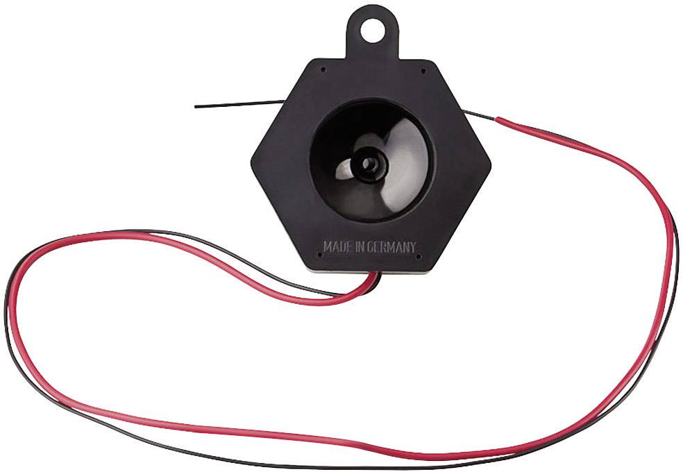 Black, hexagonal speaker with red and black cable, inscription 'MADE IN GERMANY'.